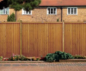 A photo of a gold closeboard fencing panel