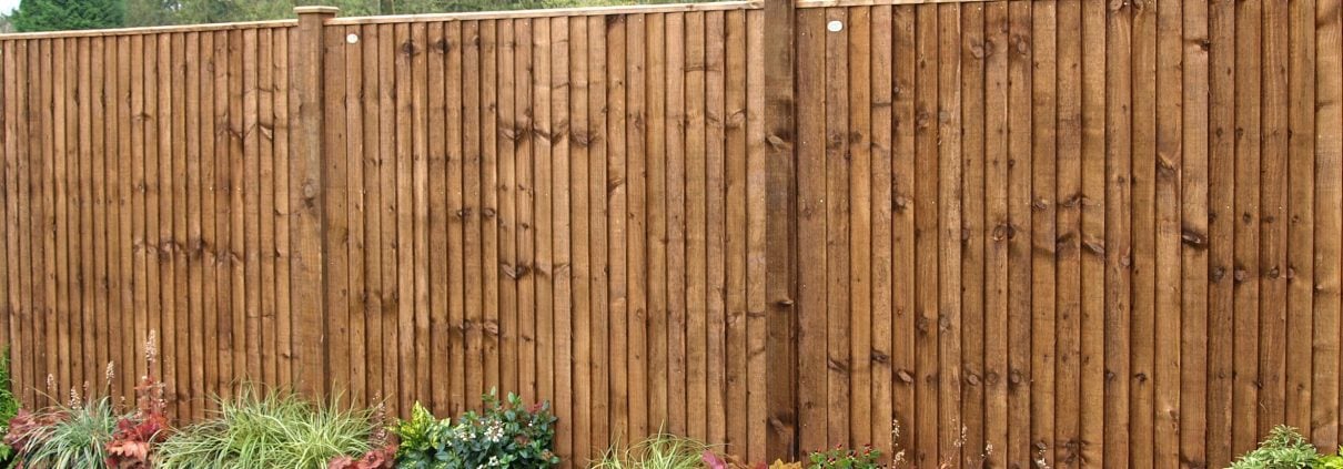 A photo of heavy duty closeboard fence panels in a garden