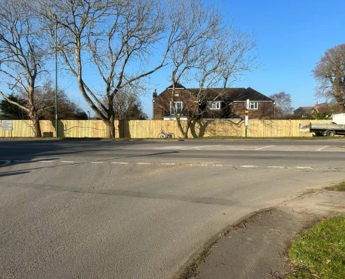 Closeboard Fencing along a garden by a junction