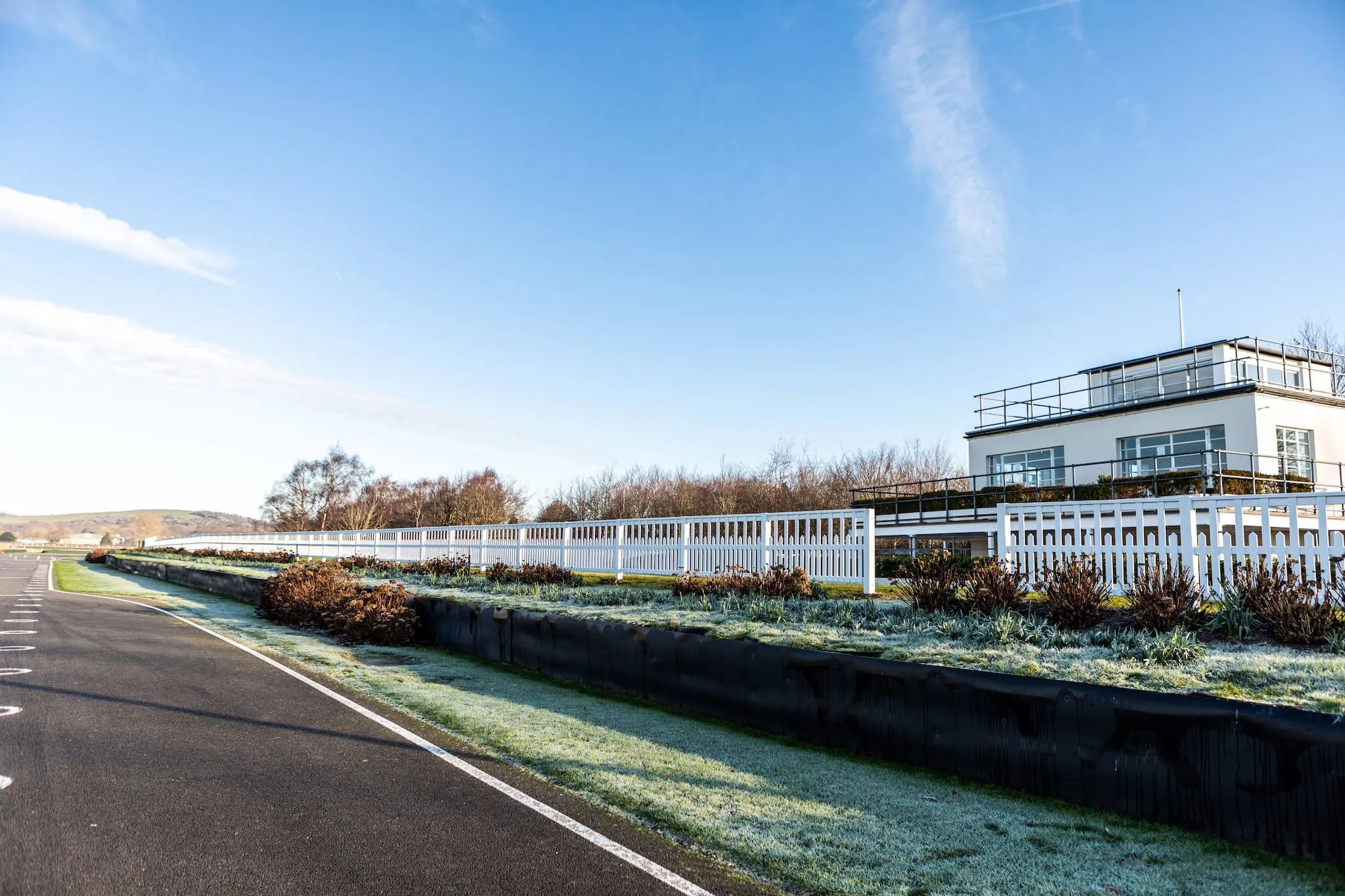 White palistrade fencing installed at Goodwood race circuit by fencing contractors Chichester