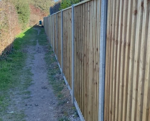 heavy duty closeboard panels with concrete posts and gravel boards