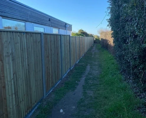 heavy duty closeboard panels with concrete posts and gravel boards