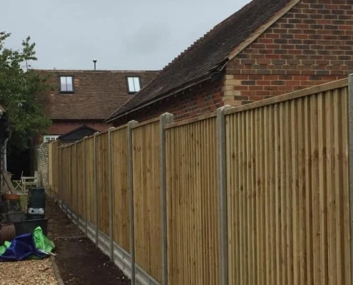 heavy duty closeboard panels with concrete posts and gravel boards