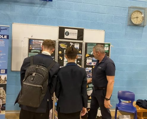 Photo of Danny Knight, managing director of Knight Fencing Ltd inspiring the next generation at Selsey Academy Careers Fair 2024