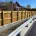 Photo of Timber closeboard fencing and armco barrier installed by Knight Fencing at Salisbury Railway Station
