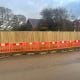 A 1950mm high build-on-site closeboard fence installed by Knight Fencing at a construction site in Rowlands Castle.