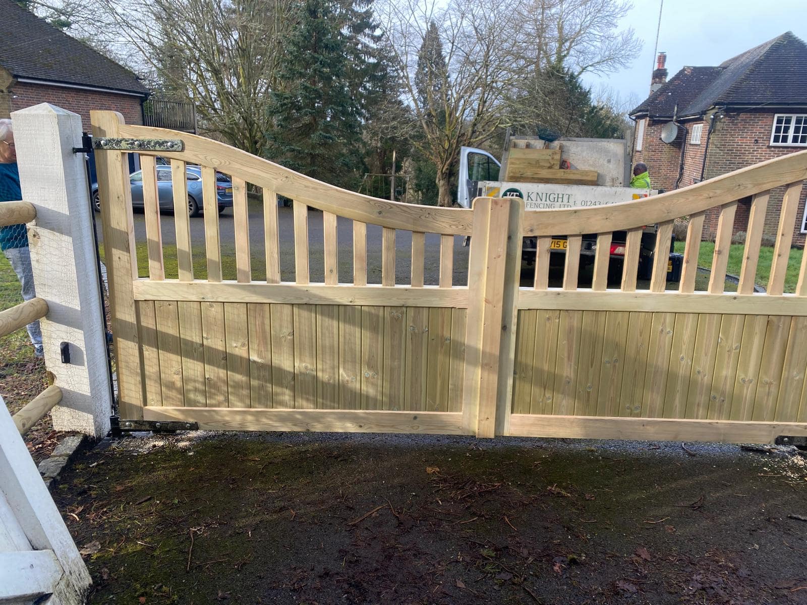 Internal view of double Highleigh timber gates highlighting the sturdy vertical construction and decorative scooped top.
