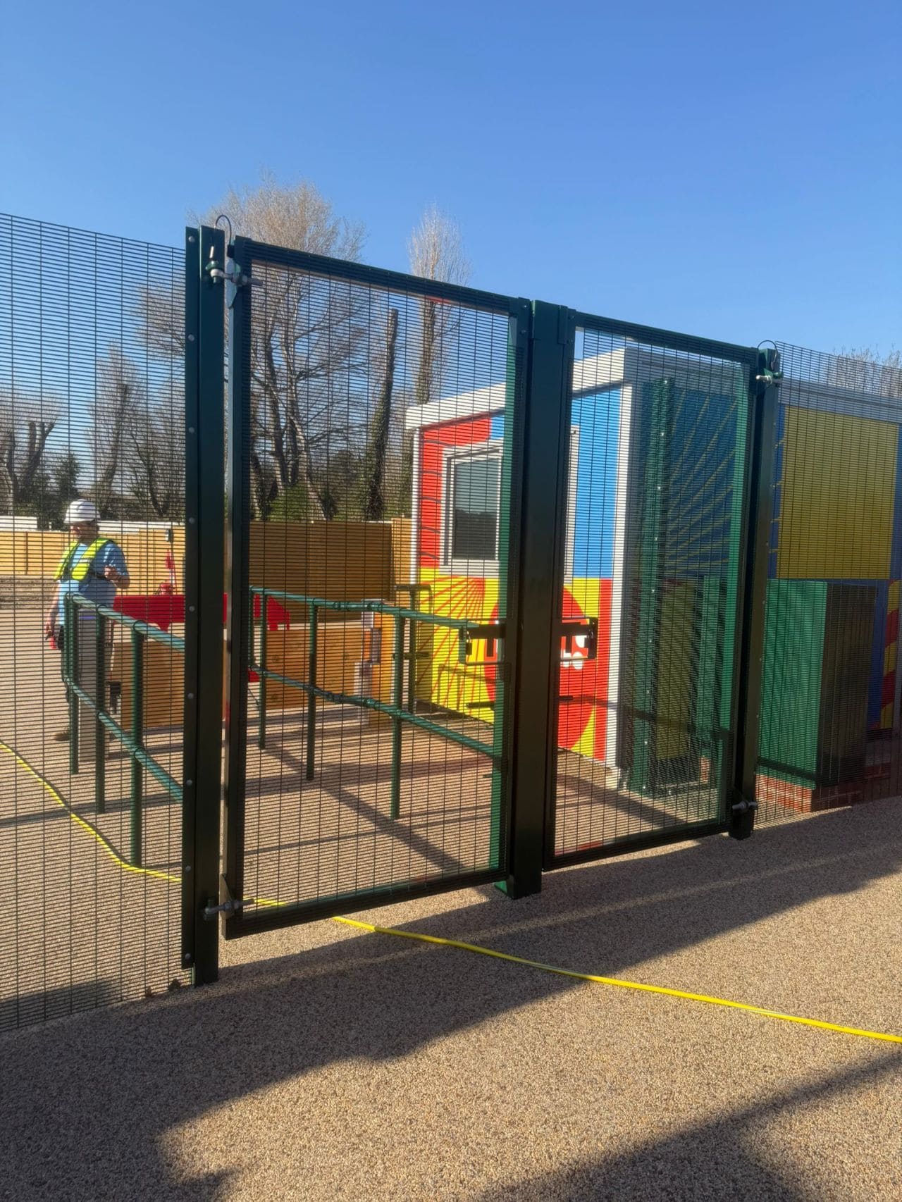 2.0m high Jacksons tongue and groove fencing and marine-coated mesh gates at Hilsea Lido