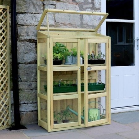 Small wooden greenhouse