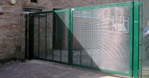 green security gate in front of a building