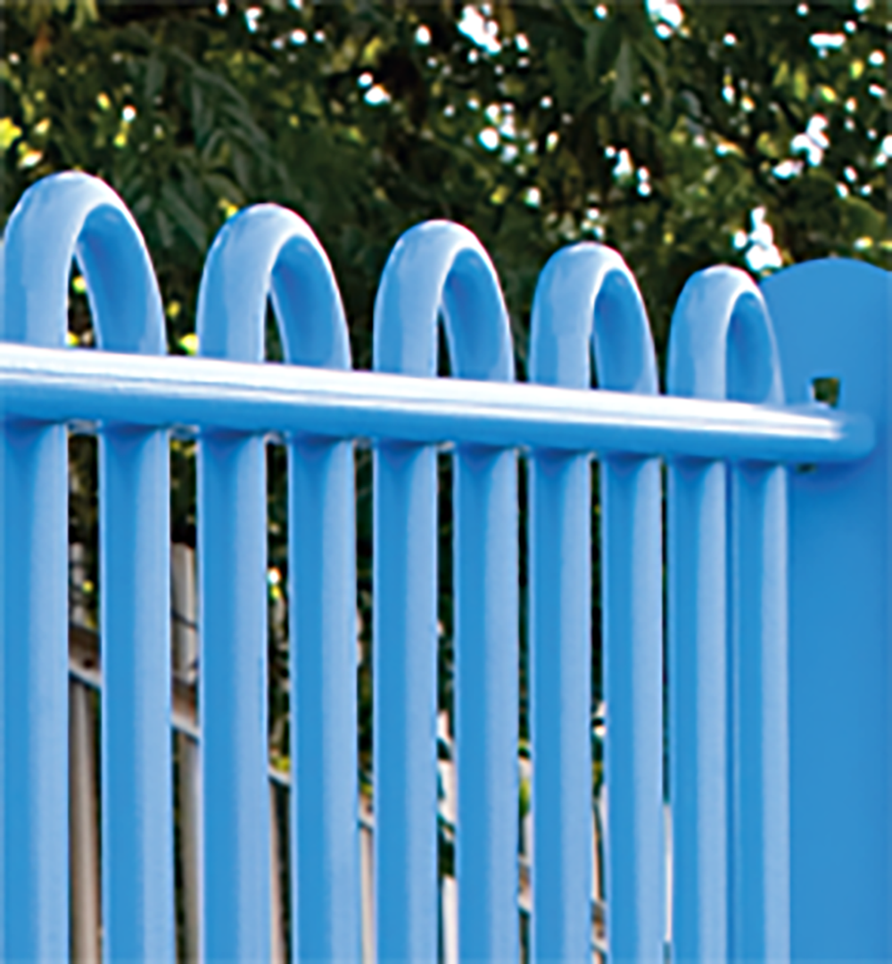 A photo a blue ultrabar railing fence in a park setting